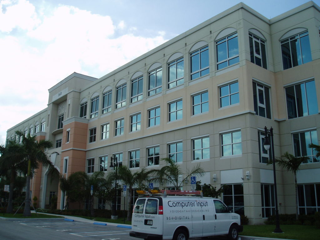The Computer Input service van outside a South Florida commercial building